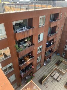 photo of patios in a 4 story apartment