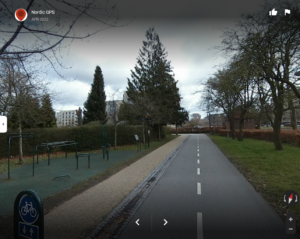 Photo capture from website of a typical greenway in Copenhagen. Shows two-way bike and sidewalk adjacent to a park and greenspace.