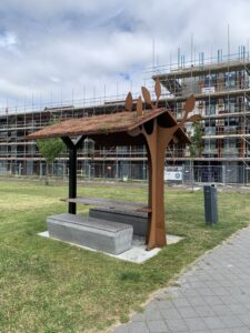 photo of park shelter and bench