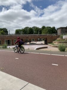 Photo of a school built right into a bike ramp to the new bridge